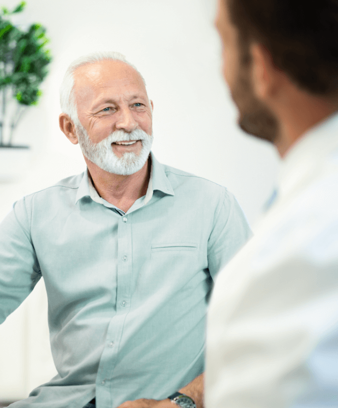 smiling, mature male patient