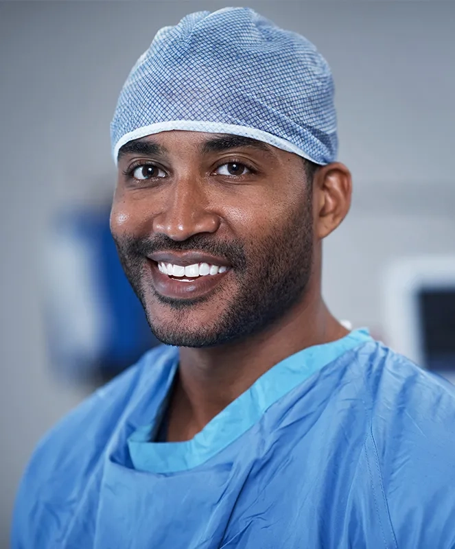 smiling, black male surgeon